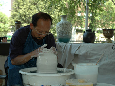 Yary Livan working with clay. Photo by Maggie Holtzberg.