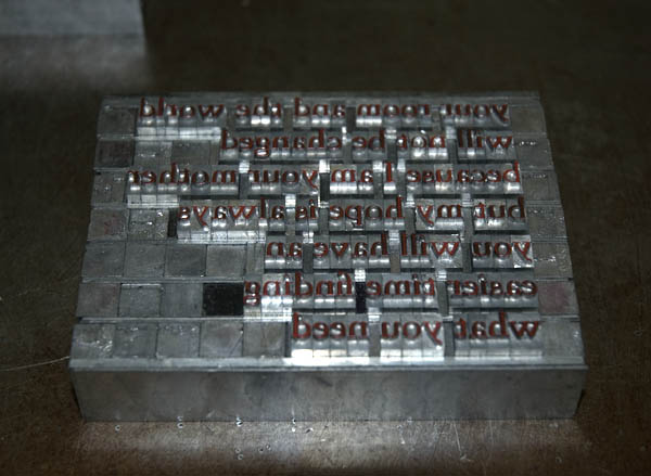 Metal type that has been inked at Firefly Press.