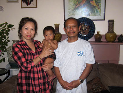 Nary Tith, Yary Livan, and grandaughter. Photo by Maggie Holtzberg