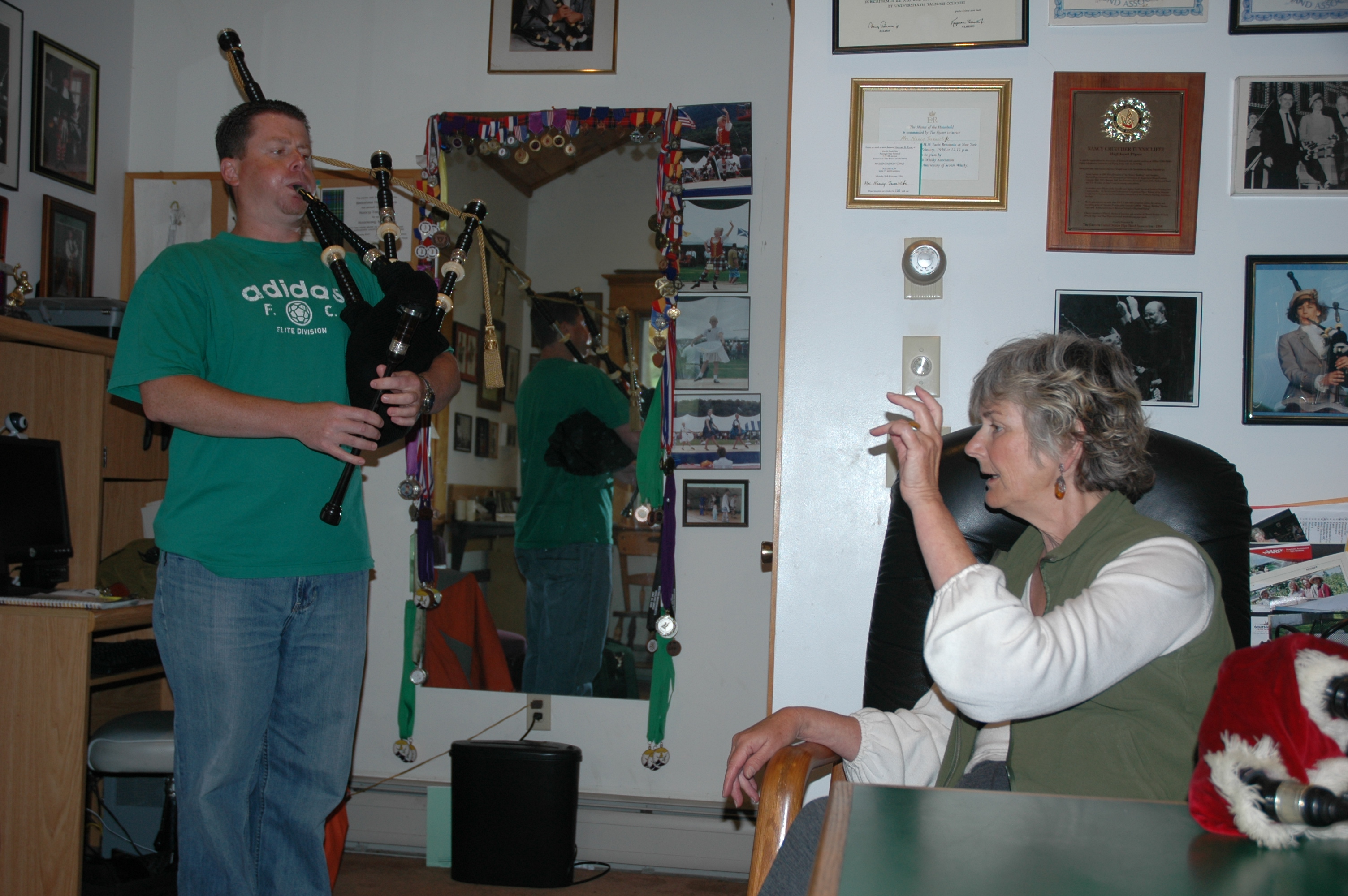 Sean Humphries being taught pibroch by Nancy Tunnicliffe. Photo by Maggie Holtzberg