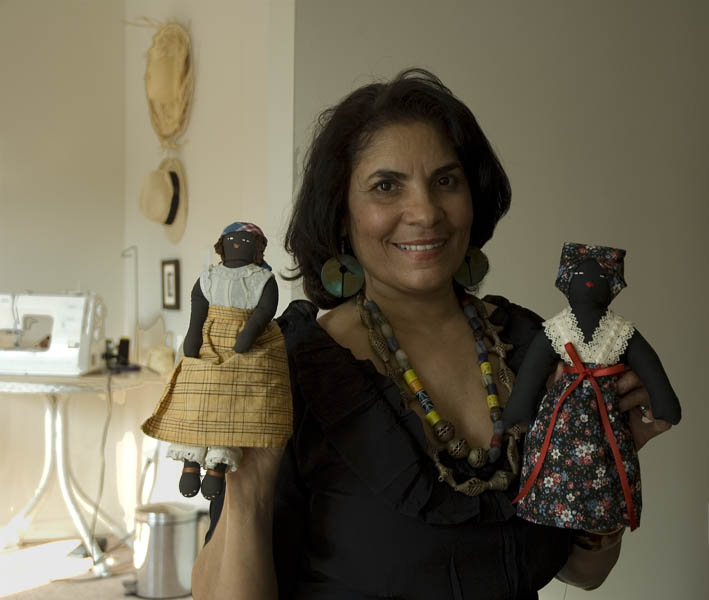 Ivelisse with two of her black dolls