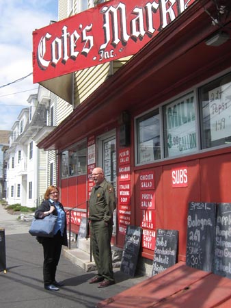 Millie Rahn and David Blackburn standing outside Cote's Market