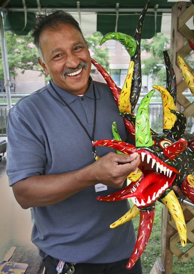 Angel Ortiz with vejigante mask. Photo by Jim Higgins