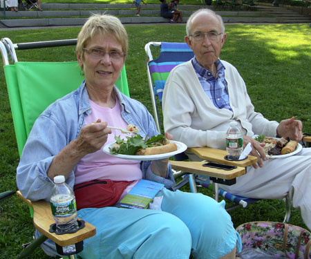 Nana and Dan Dunn enjoying Filipino food at Boarding House Park.