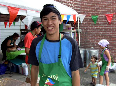 Joseph Umali helping prepare for the festival.