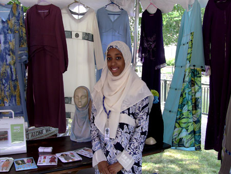 Qamaria Amatul-Wadud shows off her designs.