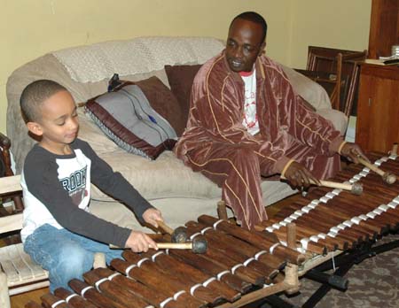 Sekou and Balla Kouyate playing balafons