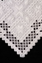 Detail of Hardanger cutwork table runner