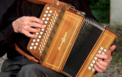 Joe Derrane with accordion. Photo by Tom Pich