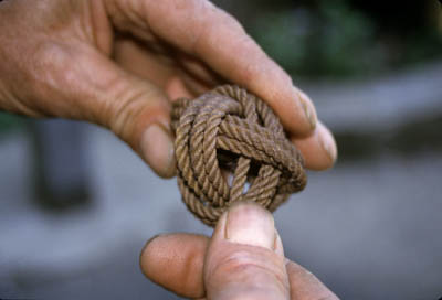 Marco Randazzo holding one of his rope sculptures. Photo by Maggie Holtzberg