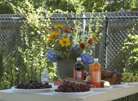 Fruit, chicken, and flower offering
